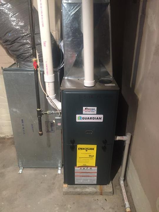 Guardian furnace cabinet with Correa Heating & Air sticker, Mendota IL